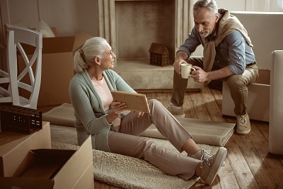 Seniors going through belongings to downsize their home
