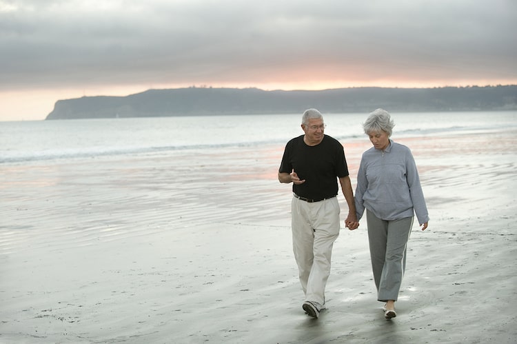 Seniors walking the beach